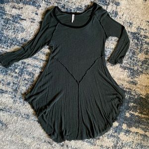 Free People semi-sheer green dress with exposed seams and 3/4 length sleeves